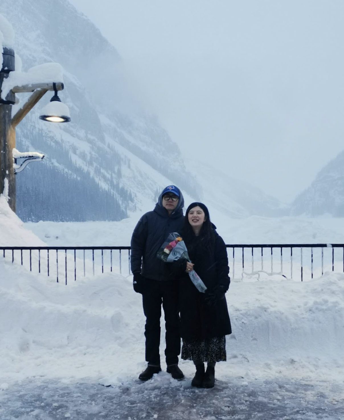 John and Andrea at a frozen lake in the mountains